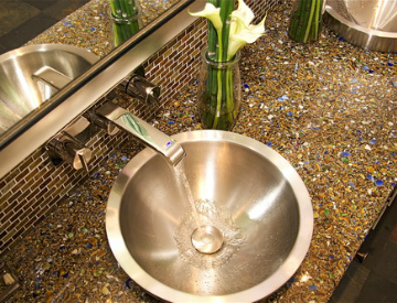 Eco-friendly countertops and sinks in your bathroom spaces often utilize recycled glass, rubber, and other like materials that combine to form a sleek, modern look for your bathroom's interior design.  Source: Houzz